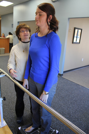 English and her patient work on balance and coordination to increase vestibular queues